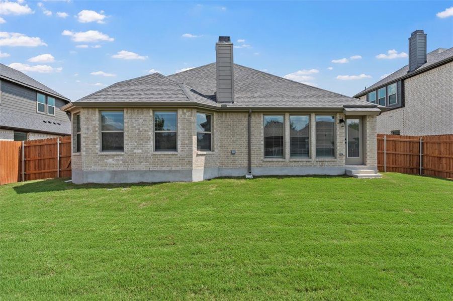 Front exterior of a new home in Renaissance, Waco, TX, highlighting curb appeal (Image 19).
