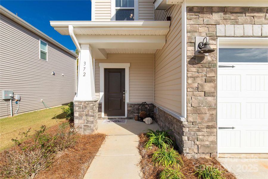 Exterior details and patio area of a home in Monterey Park, York (Image 21).