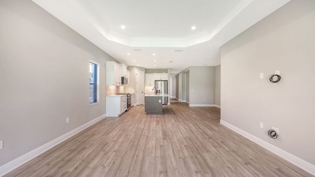 Spacious, unfurnished interior of a new home in Palm Grove Real Estate and Homes for Sale in Lakewood Ranch, FL - Neal Communities, Lakewood Ranch (Image 32). Spacious, unfurnished interior of a new home in Palm Grove Real Estate and Homes for Sale in Lakewood Ranch, FL - Neal Communities, Lakewood Ranch (Image 32).