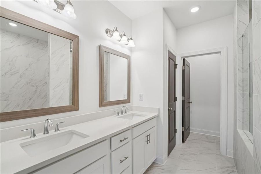 Primary Bathroom  Pictures of not of actual home but same floorplan with similar options in same community* Townhome is complete