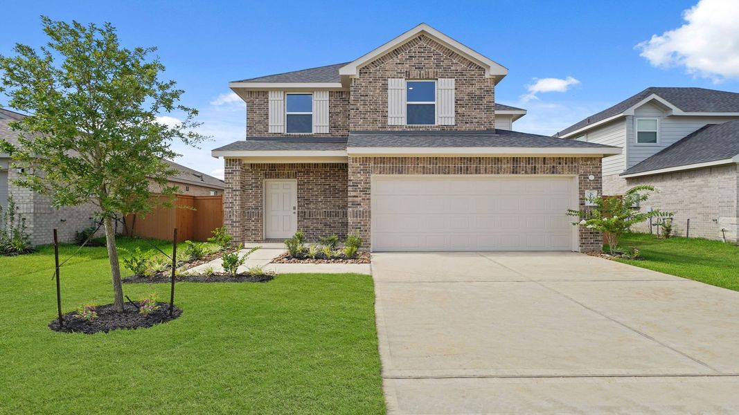 Representative exterior photo of a completed home built from the Hanna by D.R. Horton in Cypress Green, Hockley, TX (Image 2). Representative exterior photo of a completed home built from the Hanna by D.R. Horton in Cypress Green, Hockley, TX (Image 2).