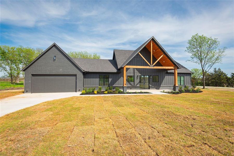 Front exterior of a new home in , Celeste, TX, highlighting curb appeal (Image 24).