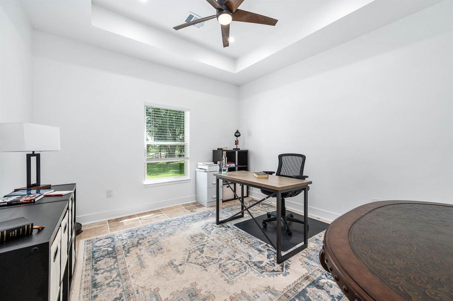 The third bedroom offers a bright and versatile space with large windows that bring in natural light and a layout that easily adapts to your needs. Currently used as a home office, this room would also make an excellent guest room, nursery, or additional bedroom.