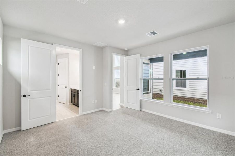 Spacious, unfurnished interior of a new home in Weslyn Park in Sunbridge 34', St. Cloud (Image 49).