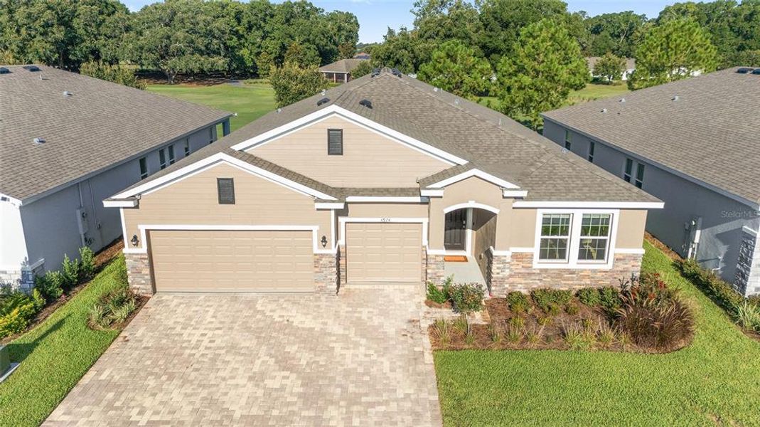 Front exterior of a new home in , Ocala, FL, highlighting curb appeal (Image 25). Front exterior of a new home in , Ocala, FL, highlighting curb appeal (Image 25).