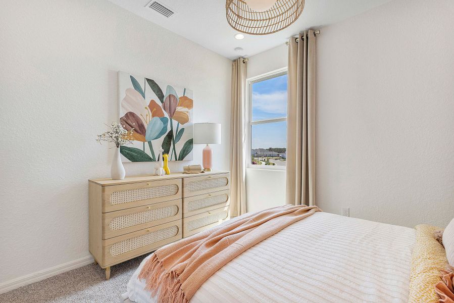 Furnished interior view inside a new home in The Sanctuary – Coastal Collection, Punta Gorda (Image 17).