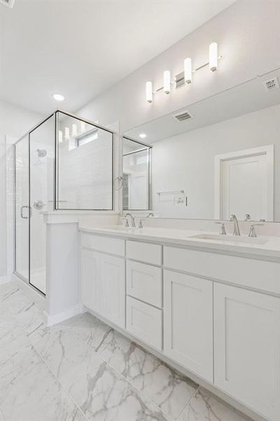 Primary Bathroom in the Stanley II home plan by Trophy Signature Homes – REPRESENTATIVE PHOTO