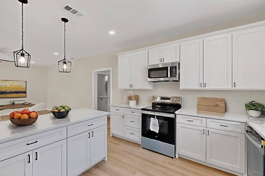 Furnished interior view inside a new home in , Rice (Image 12).