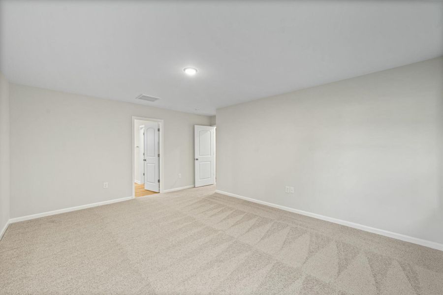 Spacious, unfurnished interior of a new home in Chandler Ridge, McLeansville (Image 32).