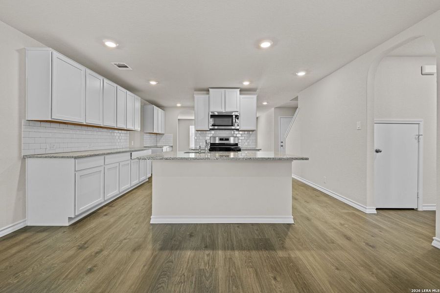 Furnished interior view inside a new home in Redbird Ranch, San Antonio (Image 9).