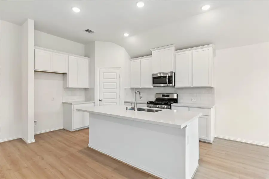 Furnished interior view inside a new home in Oakwood Estates, Waller (Image 8).