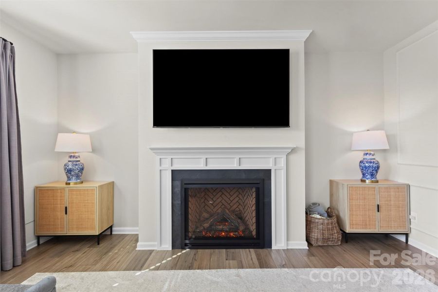 Fireplace with remote, temp control to match the room, and a fan for when heating is needed. Fireplace with remote, temp control to match the room, and a fan for when heating is needed.