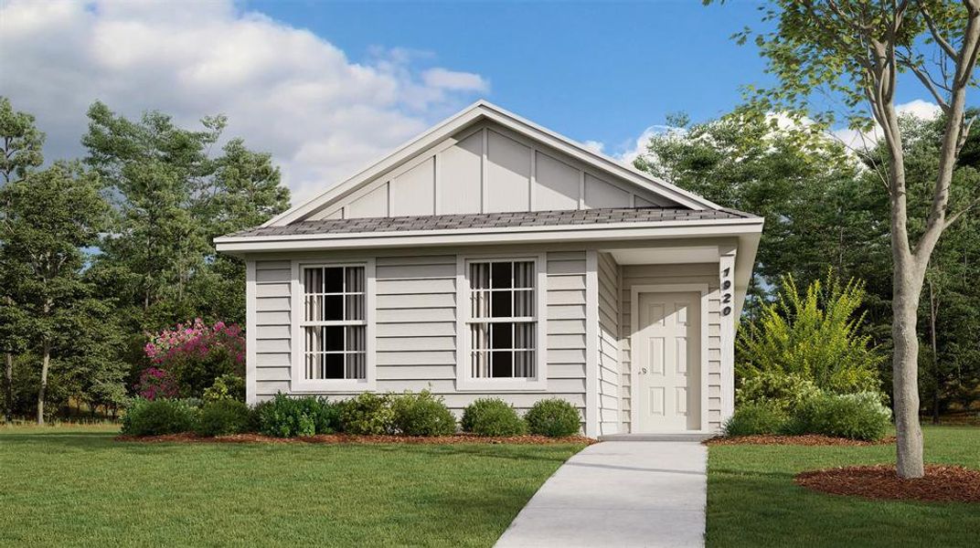 View of front of house with a front yard