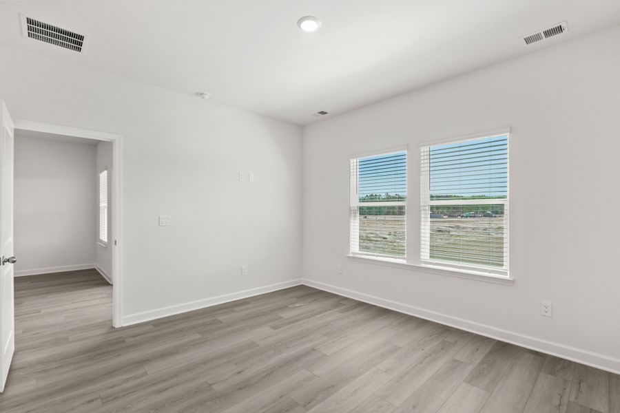 Spacious, unfurnished interior of a new home in Waterside - Boardwalk Series, Longs (Image 12).