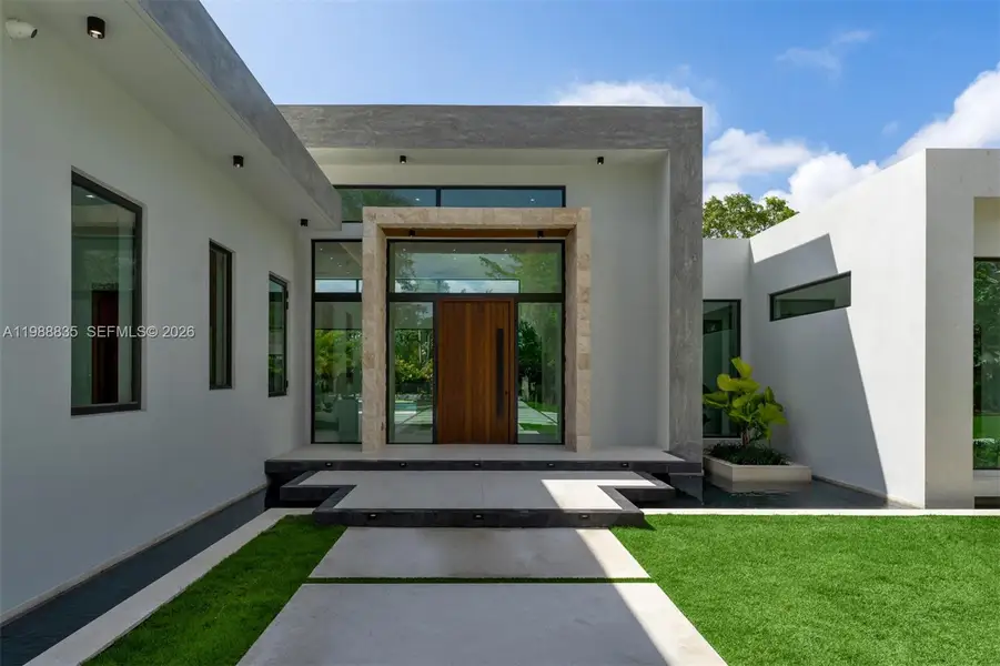 Exterior details and patio area of a home in , Miami (Image 3).