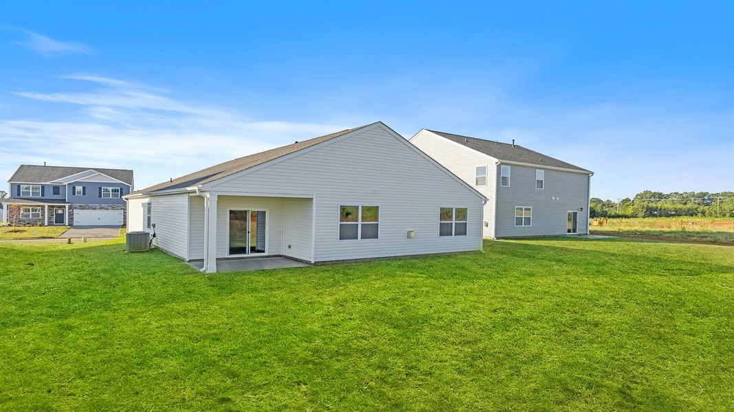 Exterior details and patio area of a home in Sherwood Gardens, Landrum (Image 19).