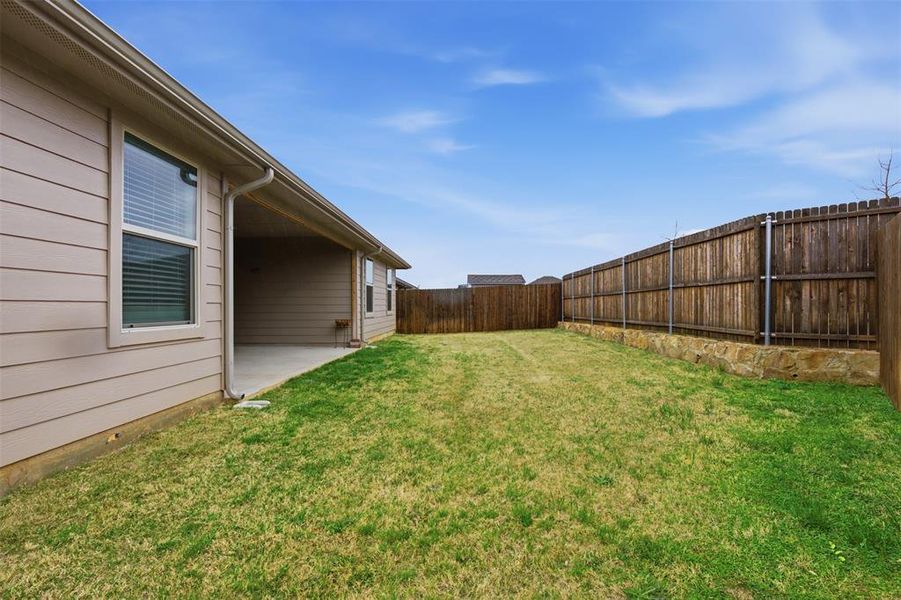 Exterior details and patio area of a home in , Burleson (Image 27).