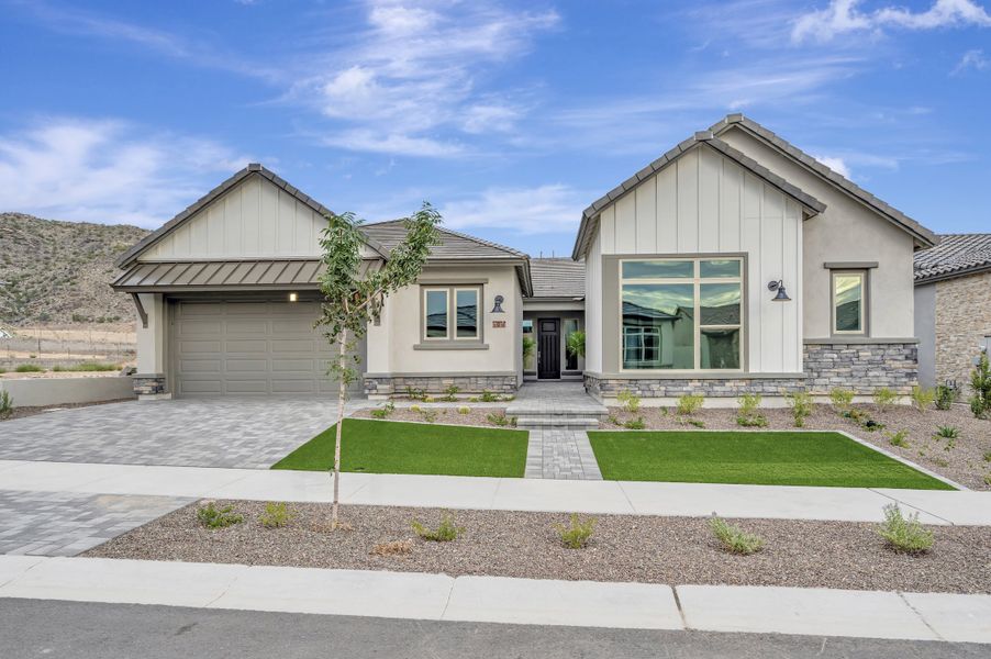 Front exterior of a new home in The Ridge at Victory, Litchfield Park, AZ, highlighting curb appeal (Image 1). Front exterior of a new home in The Ridge at Victory, Litchfield Park, AZ, highlighting curb appeal (Image 1).