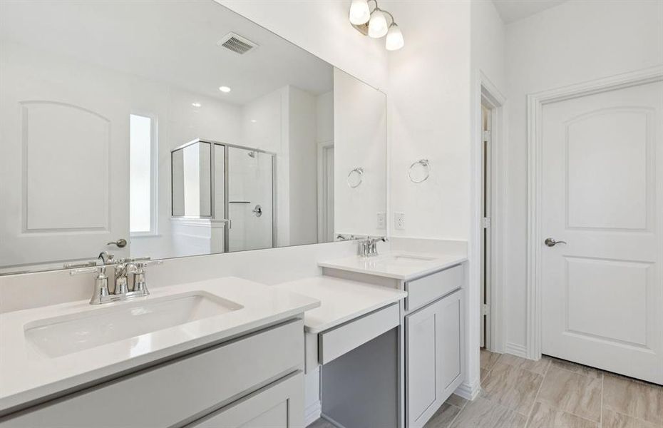 Owner's private bath with double vanity