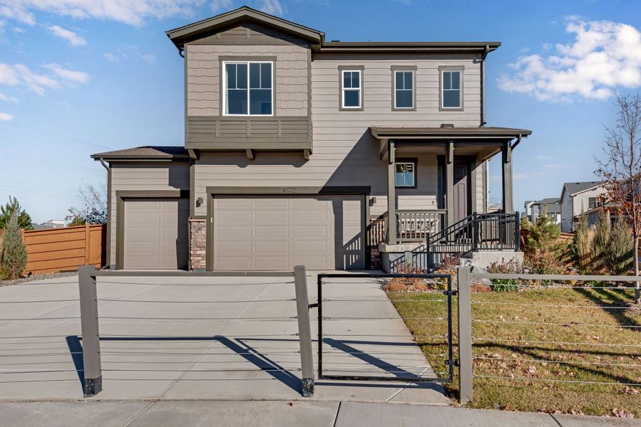 Representative exterior photo of a completed home built from the The Interlude by Tri Pointe Homes in Reunion, Commerce City, CO (Image 1). Representative exterior photo of a completed home built from the The Interlude by Tri Pointe Homes in Reunion, Commerce City, CO (Image 1).
