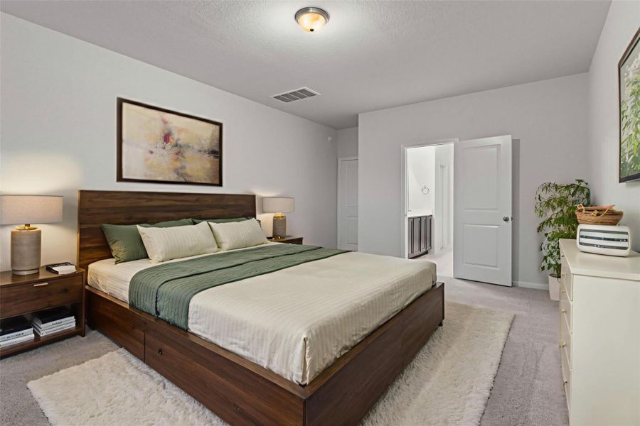 Another virtually staged view of the primary suite highlights its generous layout, showing how effortlessly it can accommodate a king-sized bed and additional furniture. A calm and peaceful space designed for true relaxation.