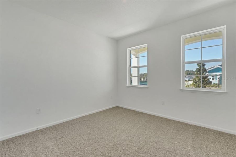 Spacious, unfurnished interior of a new home in Green Key Village, Lady Lake (Image 32).