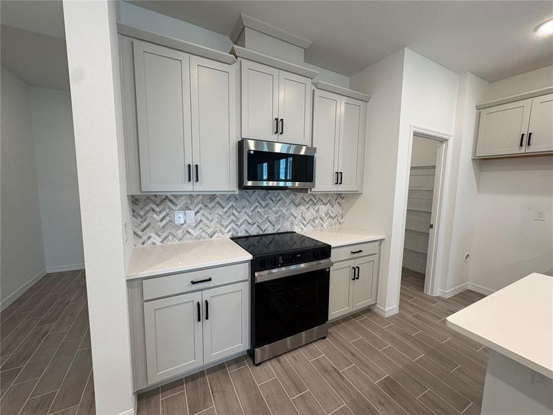 Furnished interior view inside a new home in Brack Ranch, St. Cloud (Image 7).