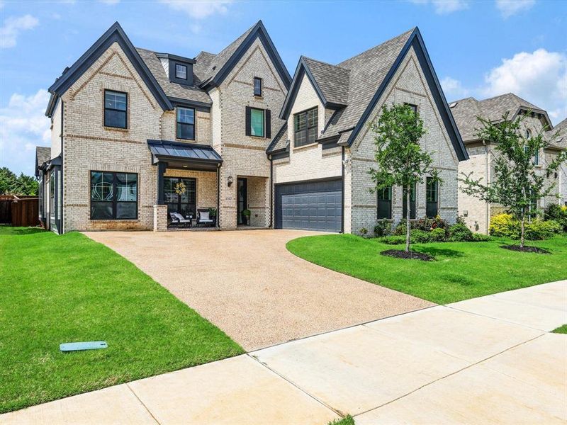 Front exterior of a new home in , Celina, TX, highlighting curb appeal (Image 1). Front exterior of a new home in , Celina, TX, highlighting curb appeal (Image 1).