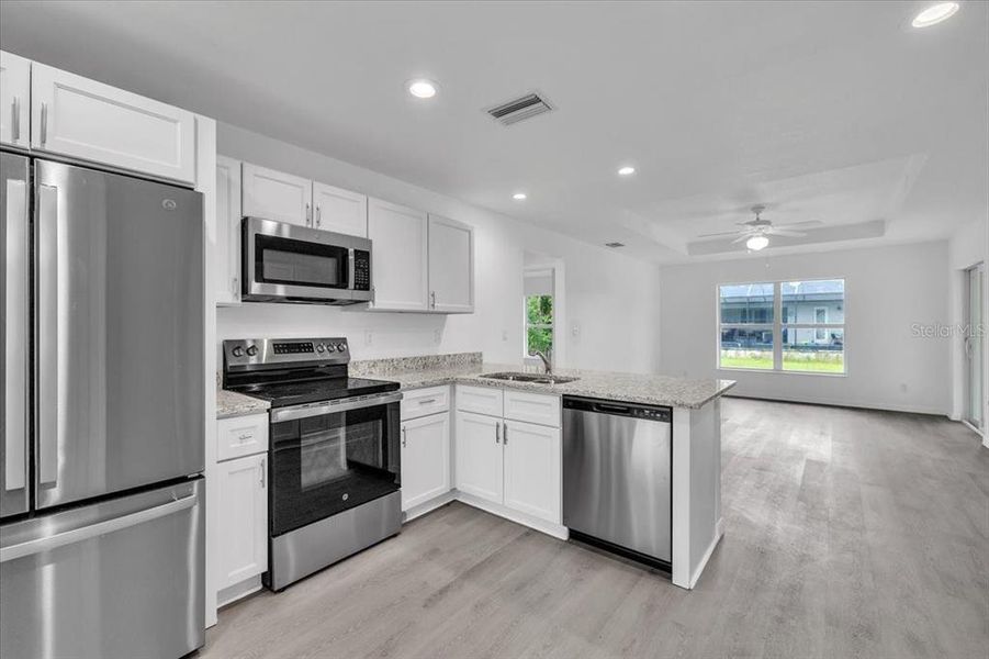 Furnished interior view inside a new home in , Punta Gorda (Image 8).
