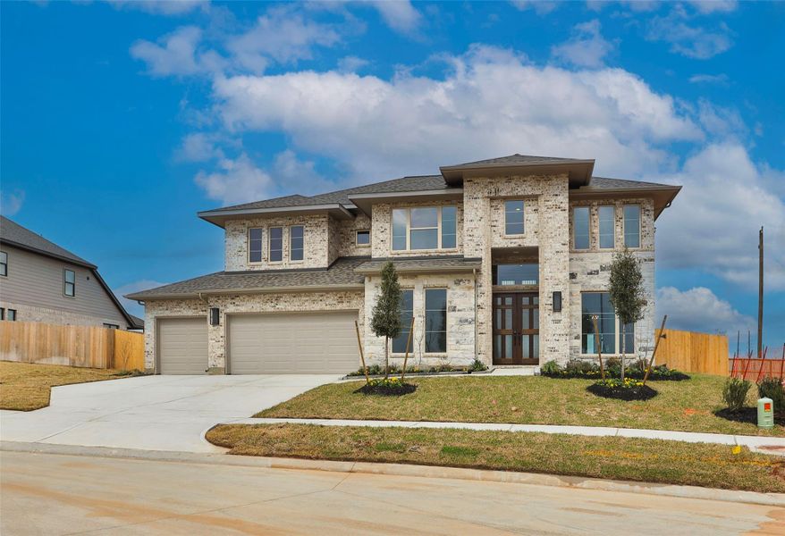 Front exterior of a new home in Escondido, Magnolia, TX, highlighting curb appeal (Image 2).