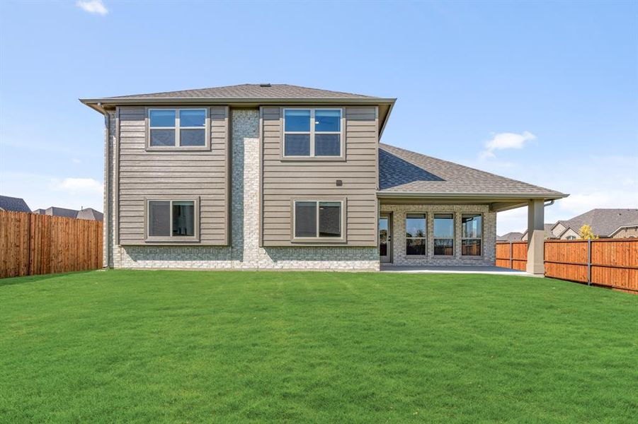 Exterior details and patio area of a home in Timberbrook 3B-4A, Justin (Image 3).