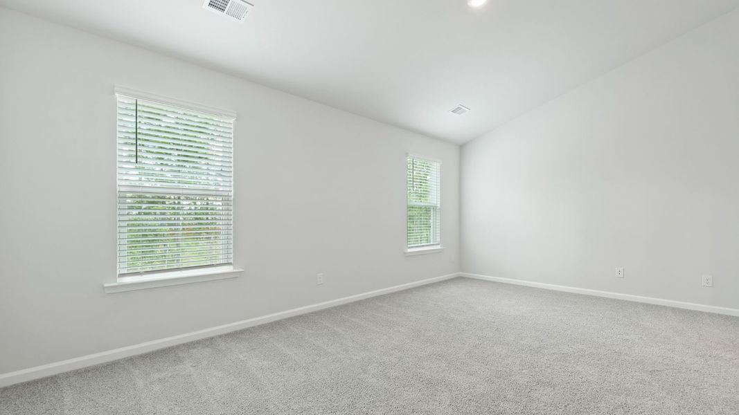 Spacious, unfurnished interior of a new home in Pine Hills Townhomes at Cane Bay, Summerville (Image 16).