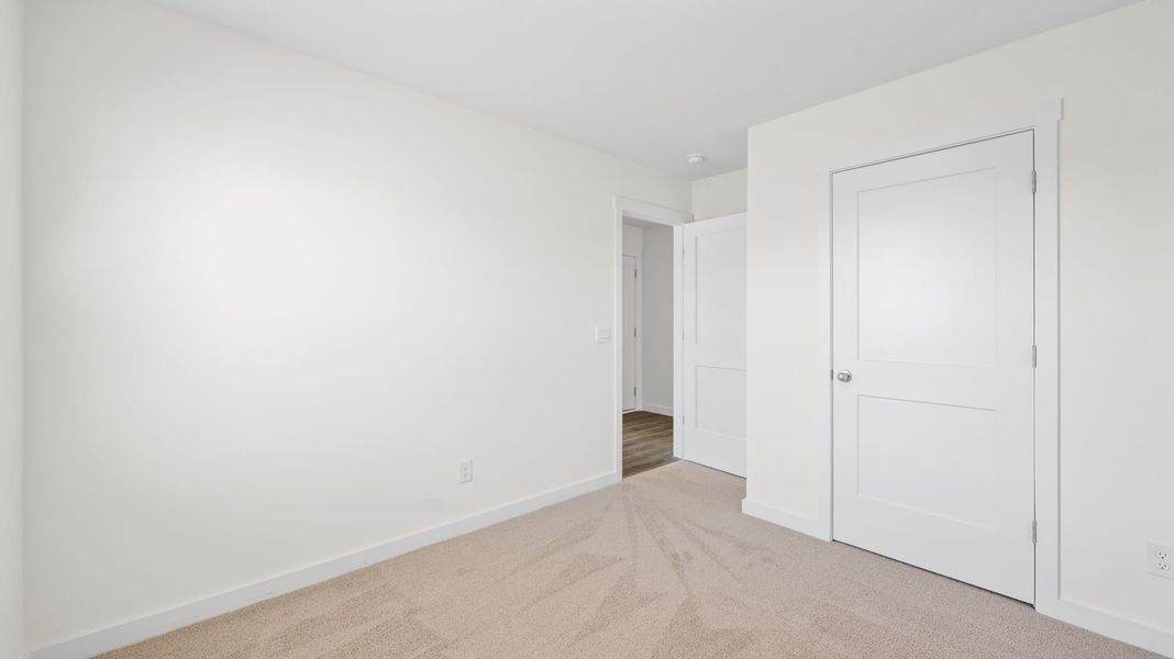 Spacious, unfurnished interior of a new home in Crescent Ridge, Niota (Image 13).