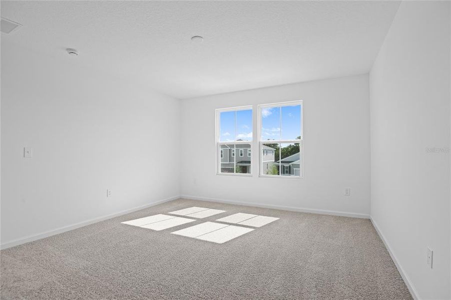 Spacious, unfurnished interior of a new home in Seasons at Shores of Lake Dell, Dundee (Image 4).