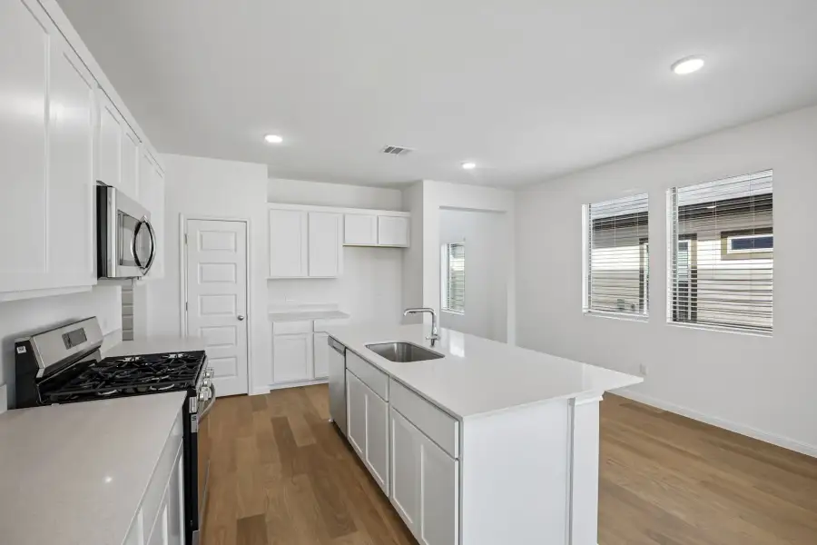 Furnished interior view inside a new home in Trinity Ranch, Elgin (Image 12).