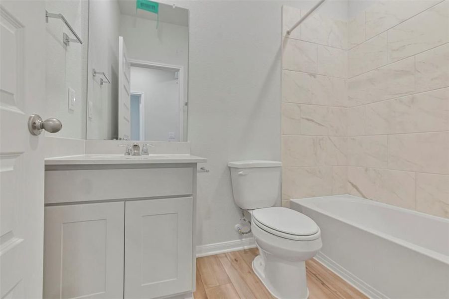 Furnished interior view inside a new home in Lakes at Black Oak, Magnolia (Image 51).