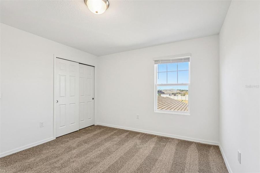 Spacious, unfurnished interior of a new home in Lake Deer Estates - Classic Series, Poinciana (Image 23).