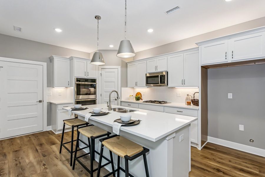 Representative furnished interior of a home built from the Redwood by Perfection Builders in Heritage Commons, Andover (Image 4).