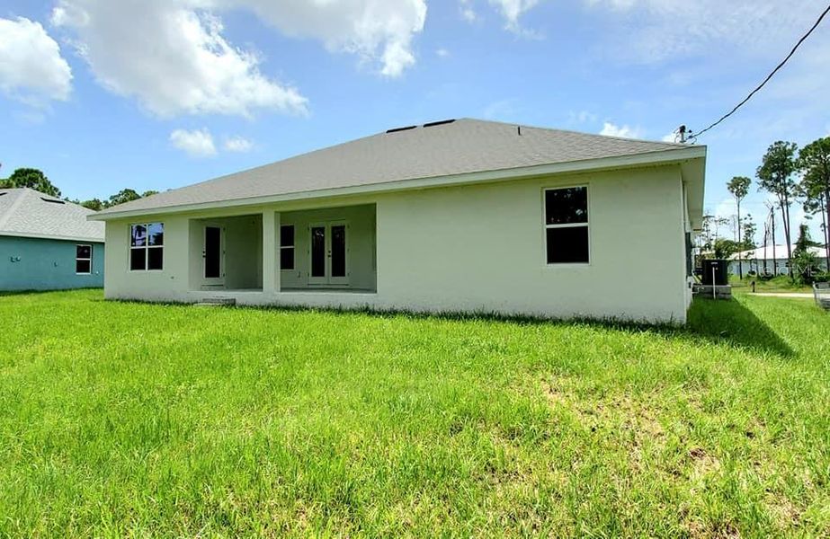 Exterior details and patio area of a home in Port Charlotte, Port Charlotte (Image 3).
