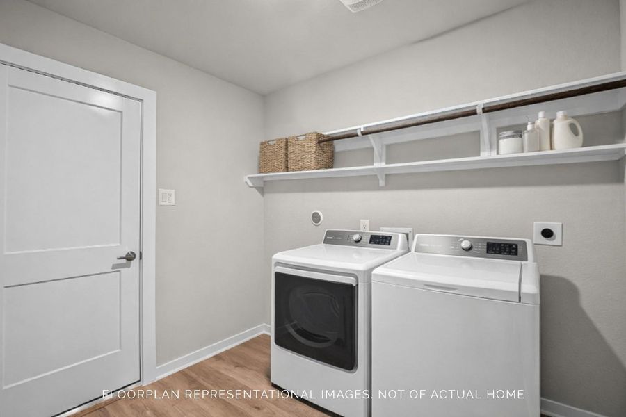 Furnished interior view inside a new home in Sorella, Tomball (Image 8).