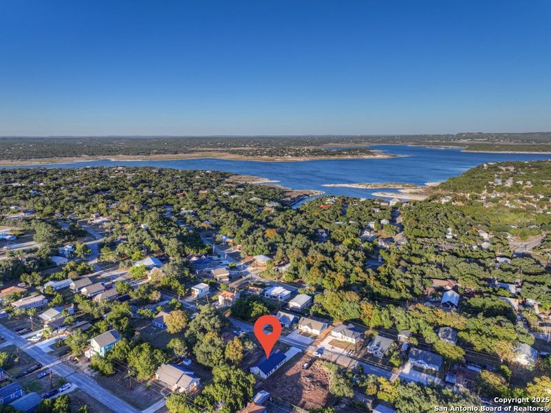 Front exterior of a new home in , Canyon Lake, TX, highlighting curb appeal (Image 1).
