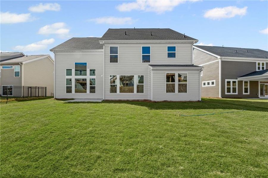 Exterior details and patio area of a home in Twin Lakes, Hoschton (Image 4).