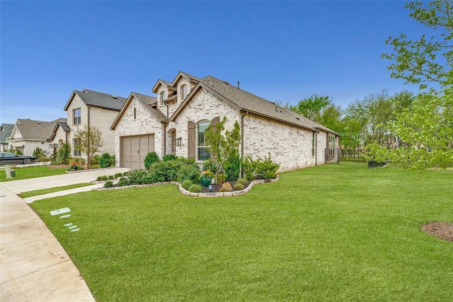Front exterior of a new home in Mantua Point, Van Alstyne, TX, highlighting curb appeal (Image 24).