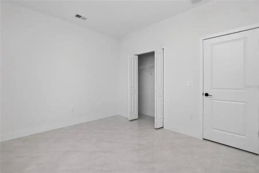 Spacious, unfurnished interior of a new home in , Port Charlotte (Image 58).