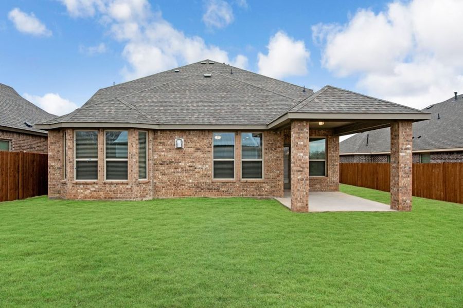 Representative exterior photo of a completed home built from the Preston by Impression Homes in Mercer Meadows, Royse City, TX (Image 20).