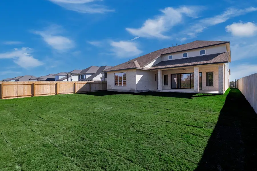 Exterior details and patio area of a home in Santa Rita Ranch - 60', Liberty Hill (Image 2). Exterior details and patio area of a home in Santa Rita Ranch - 60', Liberty Hill (Image 2).