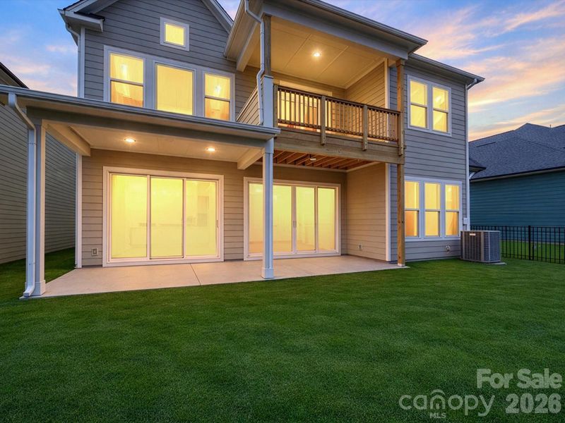 Exterior details and patio area of a home in North Creek Village, Huntersville (Image 26).
