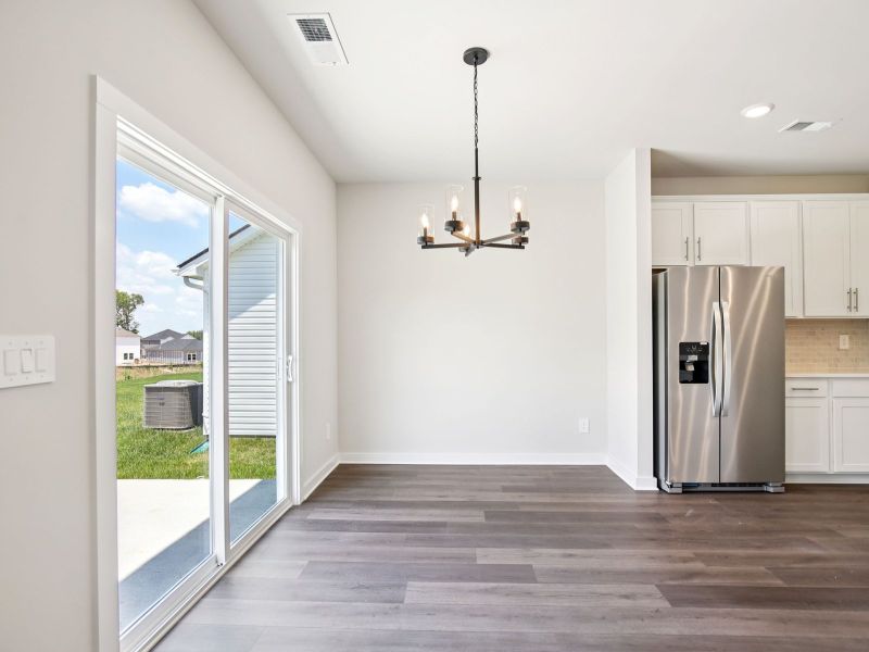 The open-concept floorplan allows for an easy flow between the kitchen and dining areas.