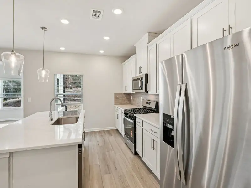 Furnished interior view inside a new home in Harmony Manor, Fairburn (Image 8).