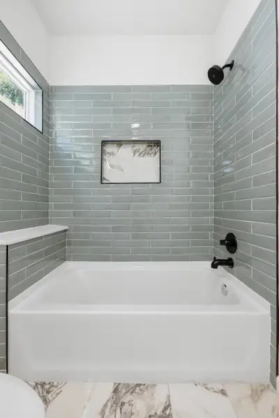 Full bathroom featuring shower / tub combination